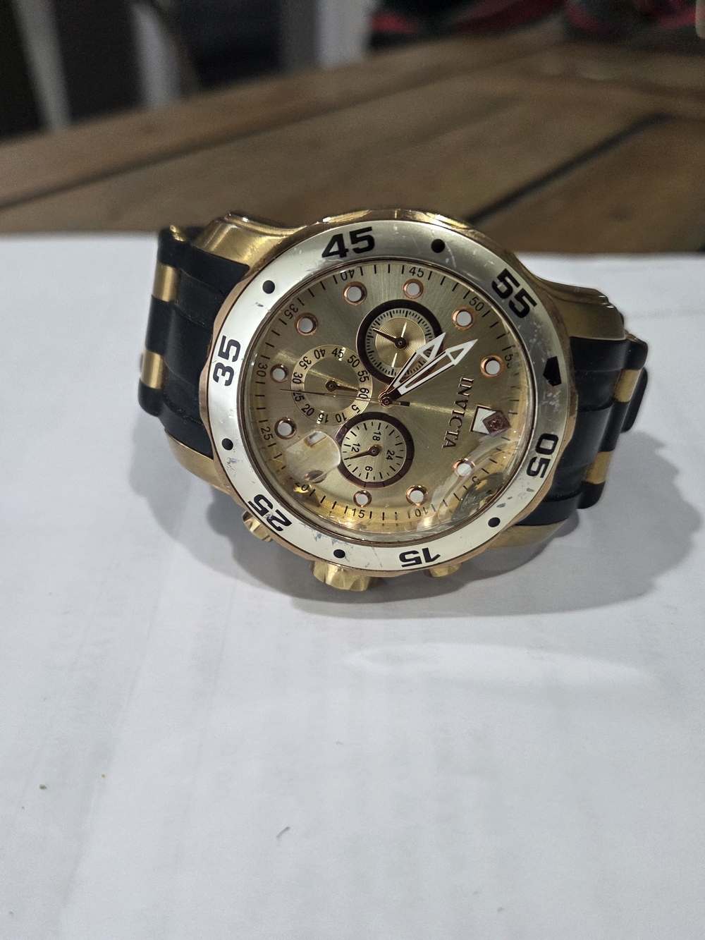 Invicta Gold Tone Chronograph Watch with Black Strap